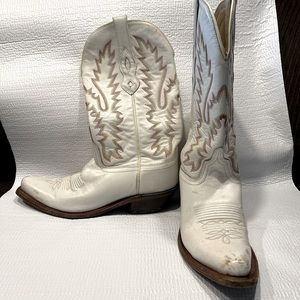Vintage white cowboy boots with rainbow stitching